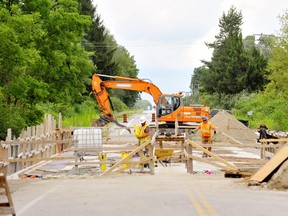 Unforeseen complications with a culvert rehabilitation project east of Langton means Forestry Farm Road north of McDowell Road will likely remain closed to through traffic into November. – Monte Sonnenberg photo