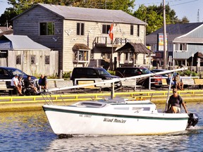 The industry association Boating Ontario says 2020 is shaping up to be a banner year for boating in the province. Here, the motor-powered sailboat Wind Hunter exits the harbour in Port Dover Thursday morning. – Monte Sonnenberg photo