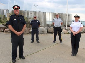 Representatives of Canadian agencies involved in the response for Sunday's St. Clair River float down gathered on the riverfront in Sarnia Friday. From left, Sarnia Police Deputy Chief Owen Lockhart, Rob Long with Canada Border Services, Const. Ian Smith with the RCMP and Kathleen Getty, with the Canadian Coast Guard.