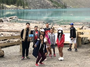 Not all visitors wear mask at the Lake Moraine in Banff Natioal Park on August 15. A noticed decreased number of visitors accounted for Parks Canada's traffic control measures, only allowing a limited number of cars to enter the area at one time. Photo Marie Conboy.