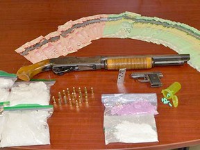 Two Chatham residents have been charged with various drug and firearms-related offences following the seizure of roughly $105,000 in suspected drugs at a Park Street home in Chatham on Aug. 12. Handout