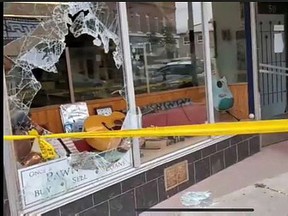 Two people smashed a window to gain access to the Once A Pawn A Time store in downtown Simcoe on Sunday morning. The store owner confronted the duo and chased them from the store. Norfolk OPP photo