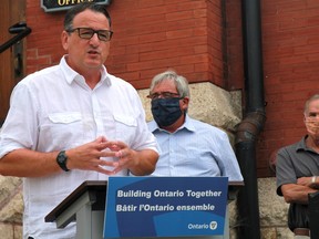 Kenora-Rainy River MPP Greg Rickford speaks at an announcement outside Kenora city hall on Friday, Aug. 14 with Kenora Mayor Dan Reynard and Coun. Chris Van Walleghem.