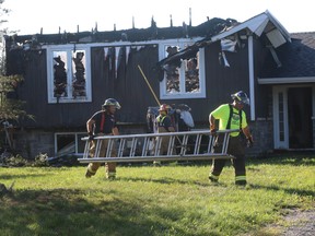 Prince Edward County firefighters remained at the scene of a McFaul Road house fire on Thursday morning. The fire broke out late Wednesday evening and the homeowner was able to escape unharmed. BRUCE BELL