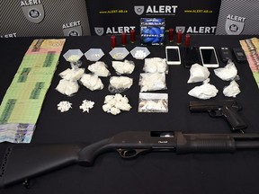 Two suspected drug dealers were arrested in Grande Prairie following an ALERT investigation. One firearm and an estimated $80,000 in drugs and cash was seized.