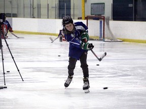 An amateur hockey player shoots at a development camp held at the TransAlta Tri-Leisure Centre in Spruce Grove late last month. The facility recently reopened after being shuttered like so many other things during the COVID-19 pandemic.