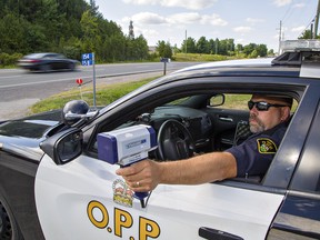 Cst. Ken Johnston of County of Brant OPP conducts speed enforcement on Highway 24 north of Brantford on Thursday. In an eight-hour period overnight, four drivers were charged with stunt driving in Brant.