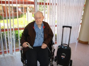 John Dahlseide, a resident at Cold Lake Long-Term Care Centre, enjoys using the new portable oxygen concentrator that was recently donated by the Cold Lake Healthcare Centre Auxiliary.