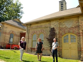 Jayne Trachsel (left), vice president of the Stratford and District Historical Society, and Allan Tye (right), president the Architectural Conservancy of Ontario Stratford-Perth, recently donated $2,500 and $200 respectively to gallery curator/director Angela Brayham in support of a $50,000 architecture feasibility study for the 140-year-old Gallery Stratford building. Galen Simmons/the Beacon Herald/Postmedia Network