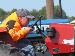 Kyle Ross from Wabash, Ont., leans into the competition at the 2017 Lambton County Plowing Match held in Dawn-Euphemia Township.