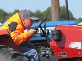Kyle Ross from Wabash, Ont., leans into the competition  at the 2017 Lambton County Plowing Match held in Dawn-Euphemia Township.
