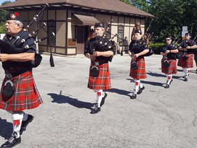 Pipers from Royal Canadian Legion Br.  642 march to the Chatham cenotaph on Wednesday to mark the Raid on Dieppe, France, which took place during the Second World War on Aug. 19, 1942. Trevor Terfloth/Postmedia Network