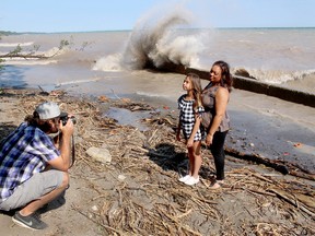 Documentary photographer Colin Boyd Shafer photographs North Buxton residents Michelle Robbins and her daughter Layla Bardyla, 9, for a project he is working on with Environmental Defense to showcase the meaningful connections people have with Lake Erie. Ellwood Shreve/Postmedia Network