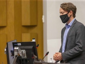 Dr. Chris Mackie, the medical officer of health for London-Middlesex, is seen addressing London city council in this July file photo. Derek Ruttan/Postmedia Network