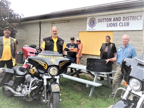 Members of the Queensmen Motorcycle Club Iona Station Chapter delivered a custom-made fire ring to the Dutton & District Lions Club Aug. 15. The fire ring will be raffled off to support the club's charitable efforts. Shown here are Everton Mclaughlan from the QMC, QMC chapter president Neil Frederick Easterbrook, Lions members Gord Ward and Patty O'Brien, Paul Shepherd from the QMC and Lions Club president John Hughes. (Handout/Postmedia Network)