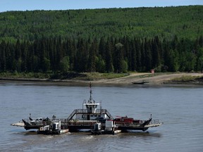 The La Crete ferry crosses to the east side of the Peace River on May 25, 2019.