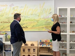 Katie Kitschke, Saffron's executive director gave Premier Jason Kenney a tour of the centre on August 13 during his local visit to the area. She outlined the high demand for counselling and the need to provide provincial funding for its public educational programming. Photo via Facebook