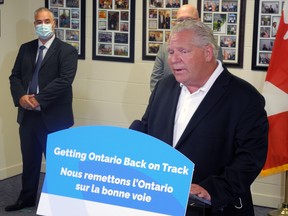 Premier Doug Ford announces new money for jails on Thursday as Mayor Jason Baker and MPP Steve Clark listen. Wayne Lowrie/Recorder and Times