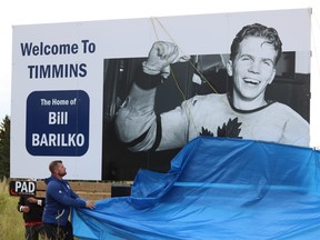 Toronto Maple Leafs super fan and memorabilia collector Mark Fera helps unveil a new billboard on Highway 101 East in Porcupine to honour the legacy of Toronto Maple Leafs legend Bill Barilko on Wednesday. Barilko’s life was unfortunately cut short after a plane crash in 1951, the year he scored the Stanley Cup winning goal. ANDREW AUTIO/LOCAL JOURNALISM INITIATIVE