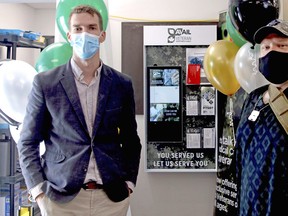 Avail Cannabis clinic director Justin Whitehall, left, and veteran Jamie Chaplin launch a recruitment centre, to be used in an upcoming study, at Northern Shores Pharmacy, Friday. Michael Lee/The Nugget