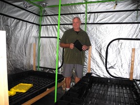 Tom Scott inside one of the pods in his Brockville area grow-op. Wayne Lowrie/Recorder and Times