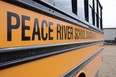 A bus is parked at the Peace River School Division's Central Operations building in Grimshaw, Alta. on Saturday, April 25, 2020.