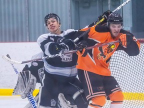 Eric Dentinger of the Fairview Flyers battles with Grant Yee of the County of Grande Prairie Kings in North West Junior Hockey League action at the Crosslink County Sportsplex in Grande Prairie back in February. The Flyers will open up training on Oct. 2 at the arena in Fairview. The NWJHL has no confirmed start date for its regular season.