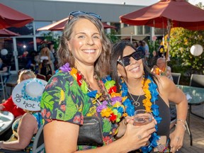 Revellers are dressed in decidedly Parrothead fashion at the 2019 Alzheimer’s Society’s It’s 5 O’Clock Somewhere fundraising gala. This year’s gala is going ahead virtually, with dinner, prizes, dessert, wine and livestreamed music by noted Jimmy Buffett cover band Spirit of the Keys. Handout/Sarnia This Week