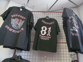 Buying outlaw biker support gear, like these T-shirts, supports organized crime, OPP warn. File photo/Postmedia Network