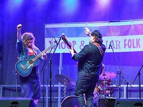 JUNO Award-winning Andrina Turenne (left) and guitarist from her backing band “Raw Denim” share a
moment of joy and celebration during their first live gig since February. (supplied photo)