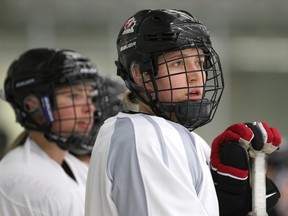 Brianne Jenner is seen in this photo taken in October 2015 waiting to take part in a drill during practice as a member of the Calgary Inferno. Youngsters in Timmins will have the opportunity speak with the Canadian Olympian by video conference during an event hosted by the Timmins Public Library this week.

Colleen De Neve/Postmedia Network
