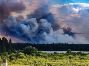 Water bombers battle a five-hectare fire near Red Lake on Monday.
