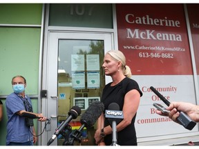 Catherine McKenna speaks to the media about an incident at her constituency office in Ottawa on Monday.