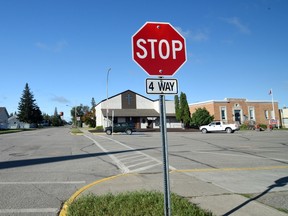 Town of Nipawin staff installed new four-way stop signs at the intersection of Center Street and 2nd Ave. W the morning of August 8. Photo Susan McNeil.