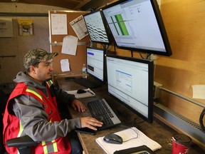 Data manager David Bellavance, of SAExploration, downloads data collected from a seismic reflection survey in Capreol, Ont. on Wednesday October 25, 2017. The survey is part of Laurentian University's Metal Earth research project being conducted in Greater Sudbury, Northern Ontario and Quebec.
