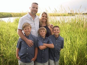 Andrea Schmick poses with her partner Daniel Campbell, her son Vance, and their two step-sons - Zachary and Austin. Submitted