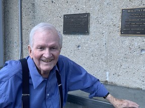 Former Brantford Alderman Art Stanbridge in front of a plaque honoring his contributions to the revitalization of the city's downtown. Stanbridge joined city officials including Mayor Kevin Davis and Coun. Joshua Wall, (Ward 5) at a re-dedication ceremony and unveiling of the plaque on the Art Stanbridge Walkway on Thursday.