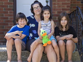 Sandra Meggitt of Brantford and her children (left to right) Bailey, age 11, Ashlynn, 4, and Abigail, 9, look forward to the resumption of school in September.