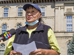 Doreen Silversmith reads a statement on Tuesday outside the Superior Court of Justice in Brantford,  where a judge extended two court injunctions preventing protesters from occupying a housing development in Caledonia.