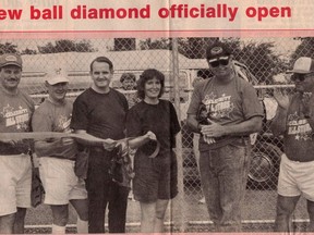 At the original opening of the Arlene Cartwright Ball diamond in 1992 this photo ran in the Gananoque Reporter:  From left are Peter Keyes, Dewey Hall, and John Nolan, all members of the fundraising committee, with Arlene Cartright and Mayor Fred Delaney cutting the ribbon as  manager of recreational services Peter Small looks on. (SUBMITTED PHOTO)