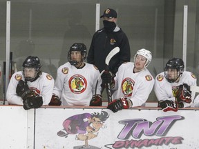 Coaches on the benches and team officials watching the action from the walking track above the Ingredion Centre ice surface wear masks during the Brockville Braves' evaluation camp. 
Tim Ruhnke/The Recorder and Times