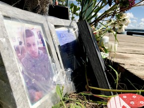 An image of Damian Sobieraj is seen at a memorial near the place where he died in September 2018. (RONALD ZAJAC/The Recorder and Times)
