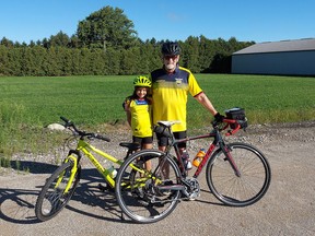 Mike Penner, right, set out on a 60-kilometre bike ride from Ridgetown to Iona Station on Sunday to raise money for annual Enbridge Ride to Conquer Cancer. His granddaughter, Bela Aguirre, joined him for the first 10 kilometres.