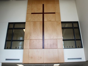 This cross is a dominant feature when walking through the front doors of St. Angela Merici Catholic elementary school in Chatham. Ellwood Shreve/Chatham Daily News/Postmedia Network