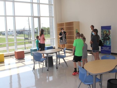 Superintendent Laura Callaghan talks about the features of the learning commons while conducting a tour of the new St. Angela Merici Catholic elementary school in Chatham, Ont. on Thursday August 27, 2020. Ellwood Shreve/Chatham Daily News/Postmedia Network