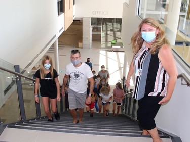 Several families took the opportunity to tour the new St. Angela Merici Catholic elementary school in Chatham on Thursday. Ellwood Shreve/Chatham Daily News/Postmedia Network