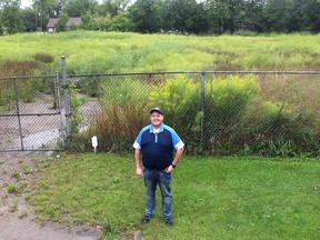 Steve Pratt, Opportunity Villages Community Land Trust board president, stands in front of the 2.5 acre site on Taylor Avenue in Chatham, where the aim is to break ground next spring on an affordable housing project. (Ellwood Shreve/Chatham Daily News)