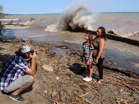 Documentary photographer Colin Boyd Shafer photographs North Buxton residents Michelle Robbins and her daughter Layla Bardyla, 9, for a project he is working on with Environmental Defense to showcase the meaningful connections people have with Lake Erie. Ellwood Shreve/Chatham Daily News/Postmedia Network