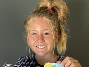 Longue Sault Public School Grade 6 student Kate Eamon with some of the masks donated by her great-niece, Mary Lefave.Handout/Cornwall Standard-Freeholder/Postmedia Network

Handout Not For Resale