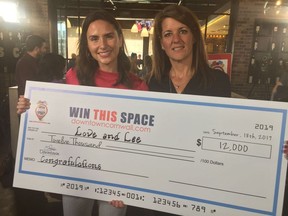 Kelsey Lee, left, of Love and Lee with Downtown BIA chair Martha Woods at the announcement of the winner of the second Win This Space contest on Wednesday, Sept. 18, 2019